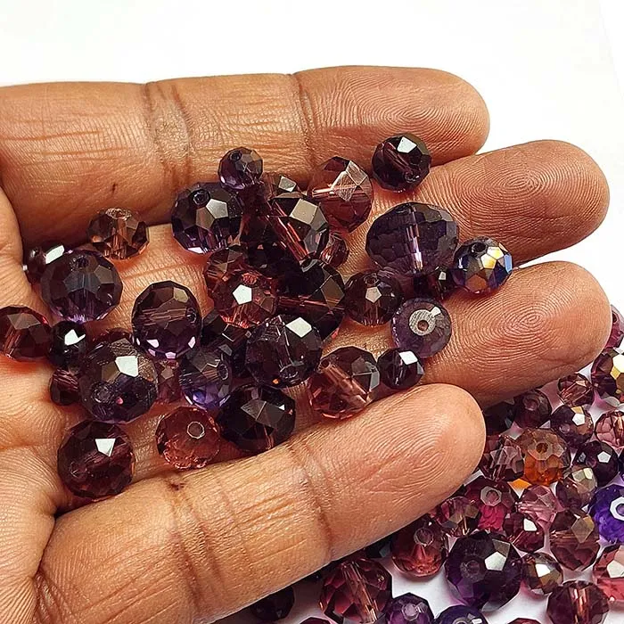 50 Grams Pkg. Purple color shade, Rondelle Faceted Crystal Mix size glass beads Size mostly encluded as 6mm, 8mm, 10mm, to some extent 4mm and 12mm mixed