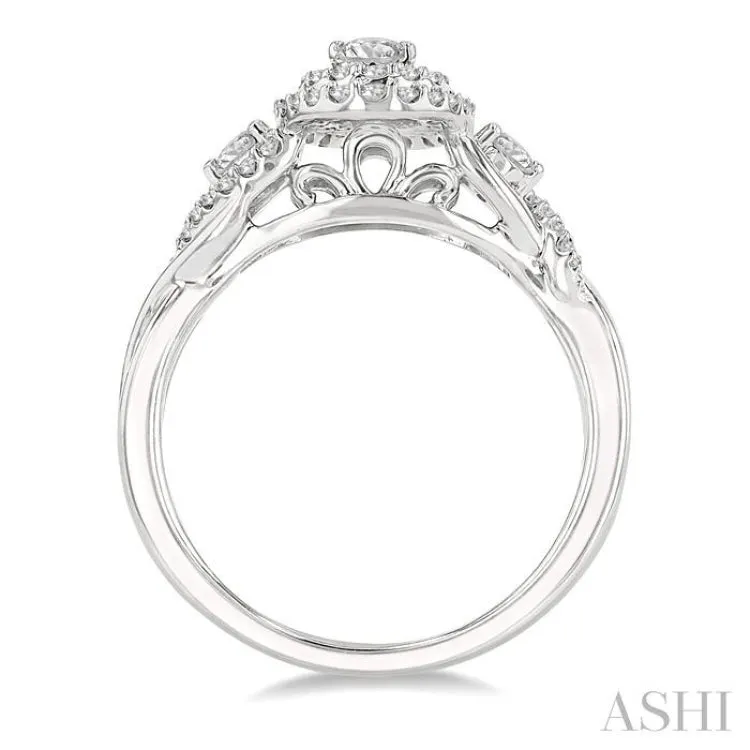 5/8 Ctw Split Twisted Shank Round Cut Diamond Engagement Ring With 1/4 ct Oval Cut Center Stone in 14K White Gold